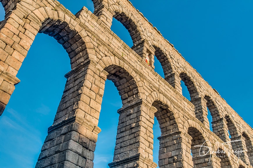 Ancient roman aqueduct of Segovia at Castile and León, Spain