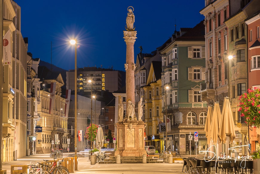 INNSBRUCK, AUSTRIA - AUG 16: St Anne Column (Annasaule) is a statue of the Virgin Mary in Maria-Theresien Street and one of its most famous landmarks on Aug 16, 2013 in Innsbruck, Austria.